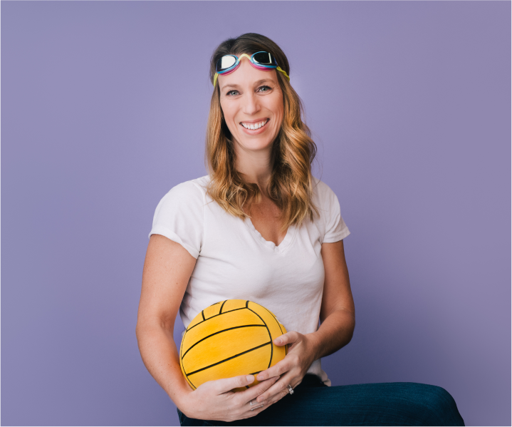 Ali Hartley with a volleyball and swim goggles